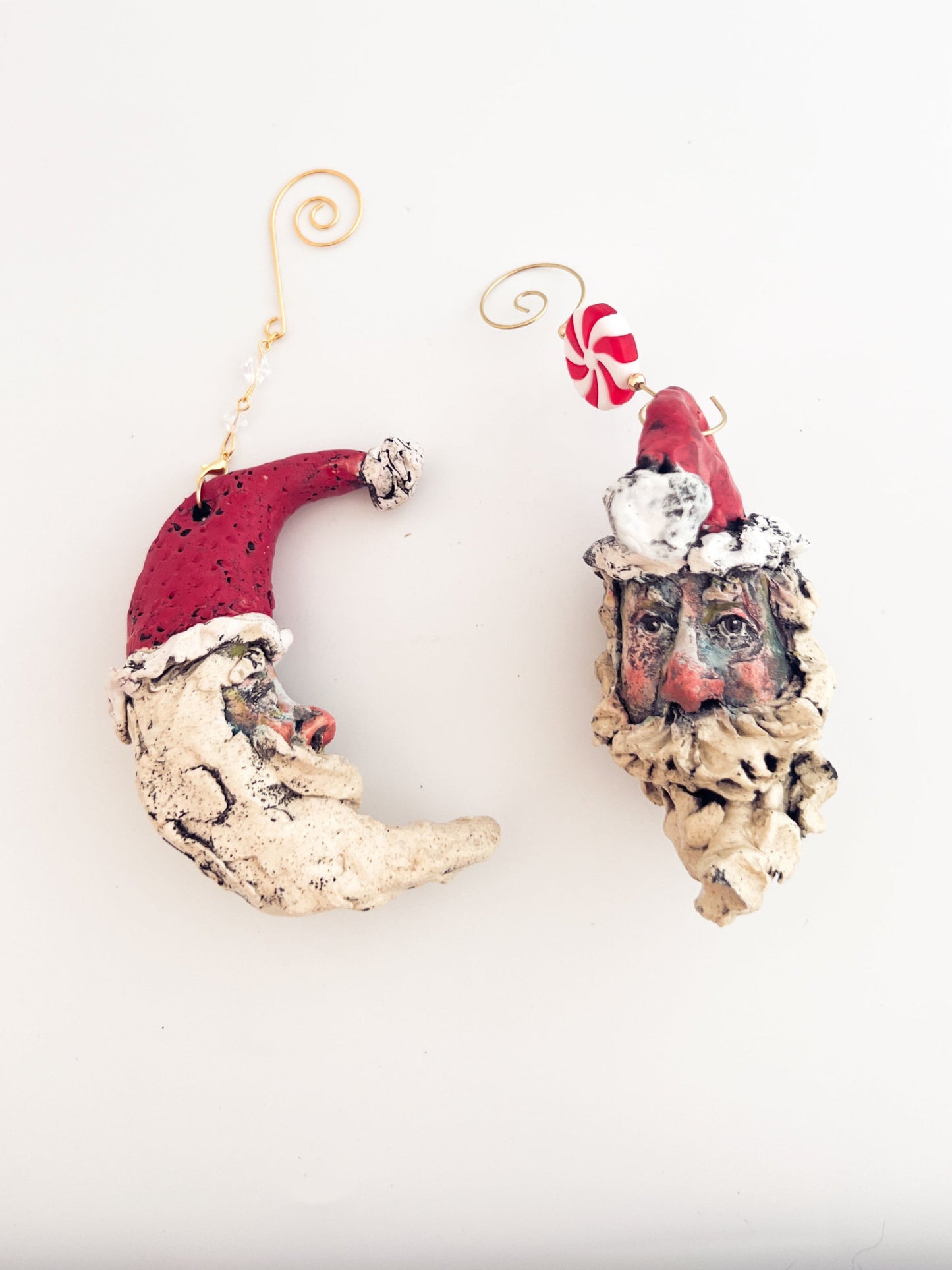 Decorative Christmas ornament with a face on a white background