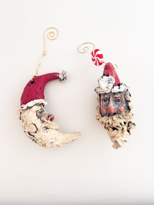 Decorative Christmas ornament with a face on a white background